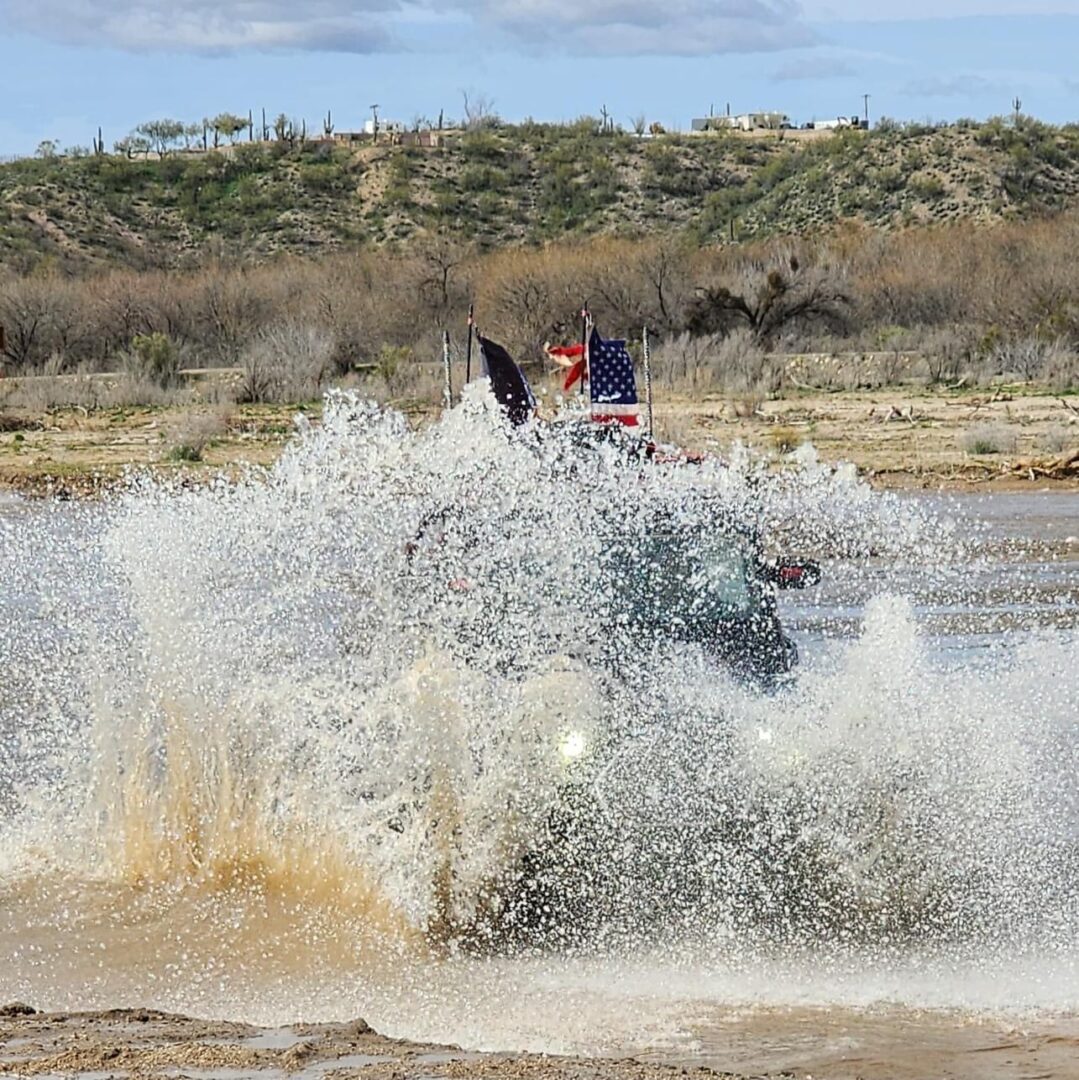 A person on a water bike in the middle of a river.