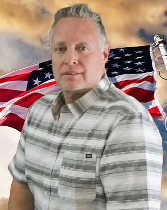 A man in striped shirt and american flag.