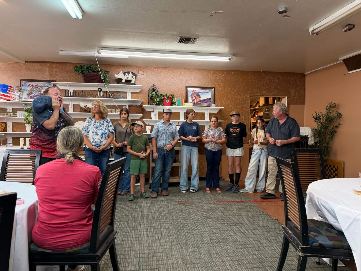 Group of people standing in community room