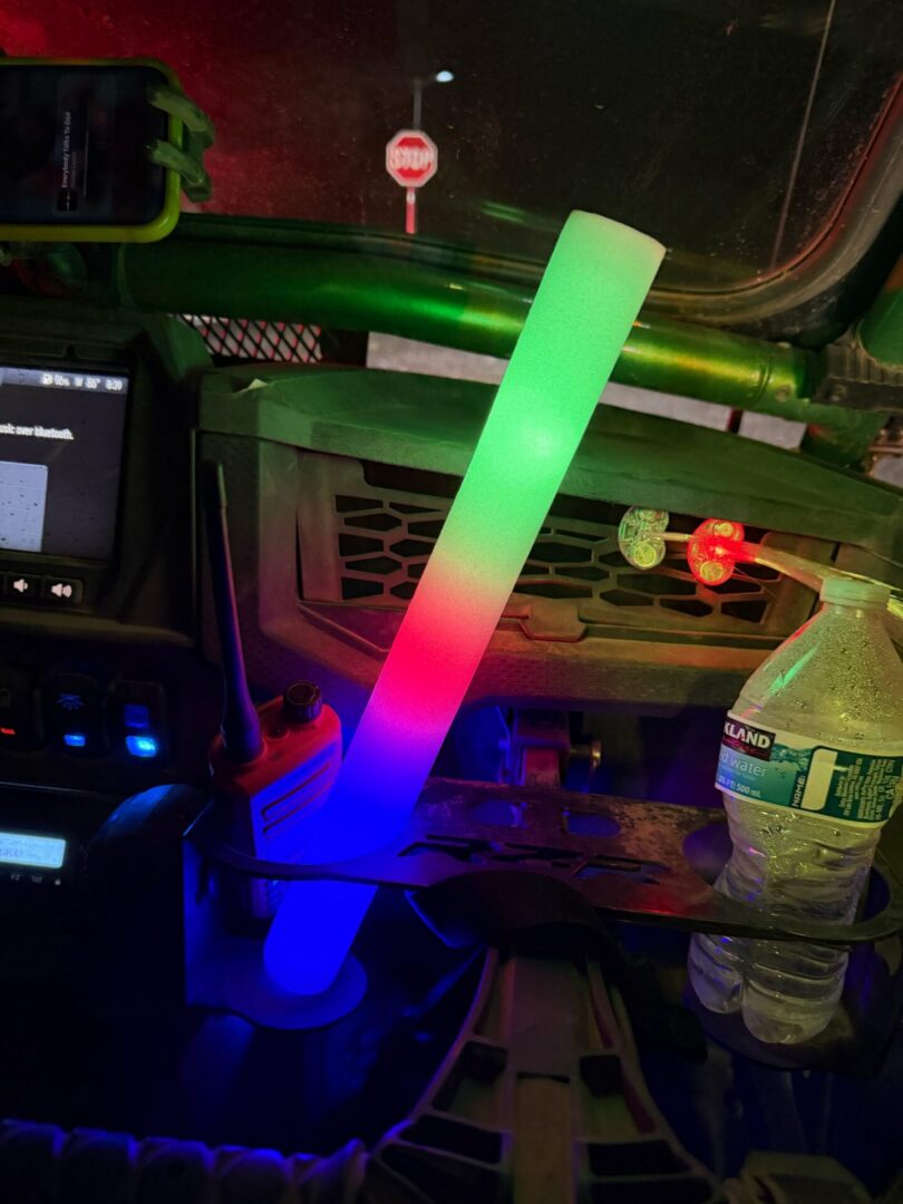 Glowing multicolor foam stick on dashboard