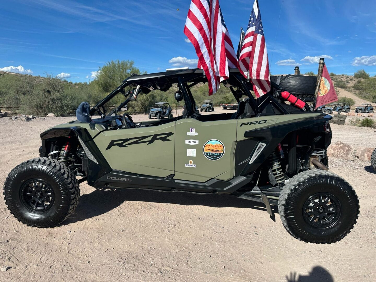 Side view of Polaris RZR with American flags