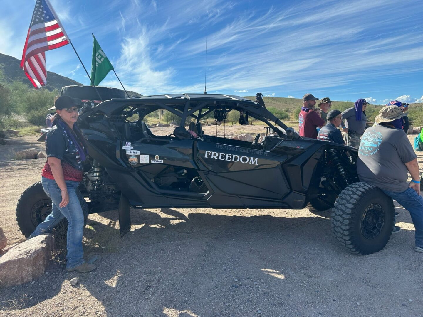 Off-road UTV labeled "FREEDOM" with flags