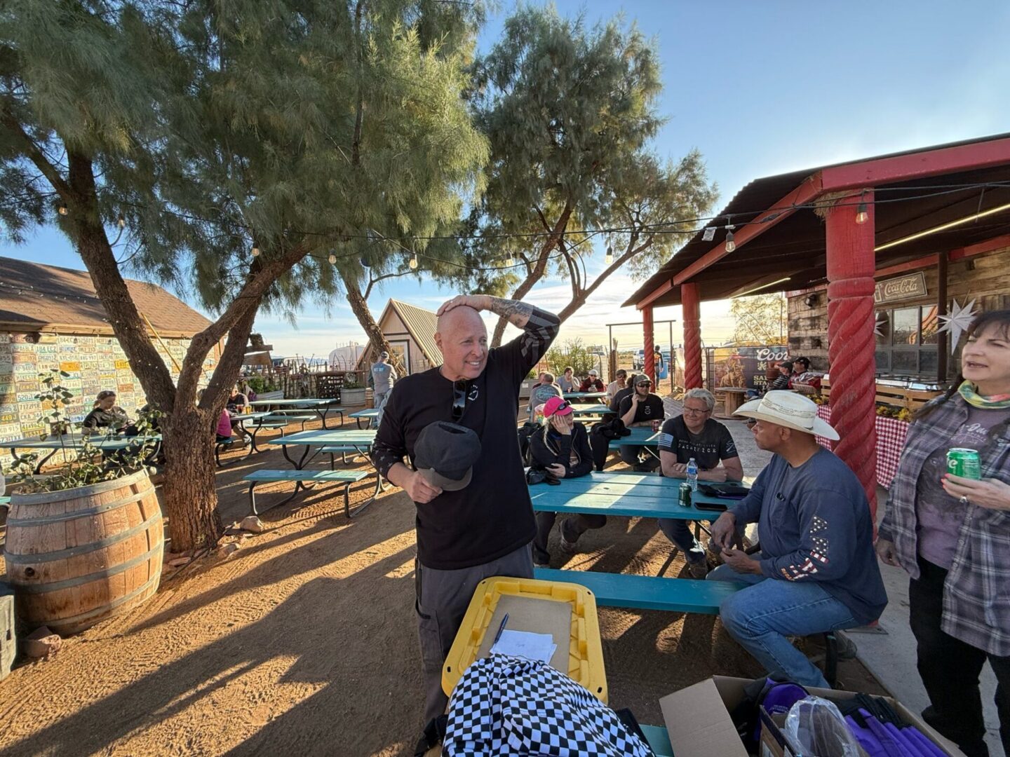 Group of people socializing at outdoor picnic area