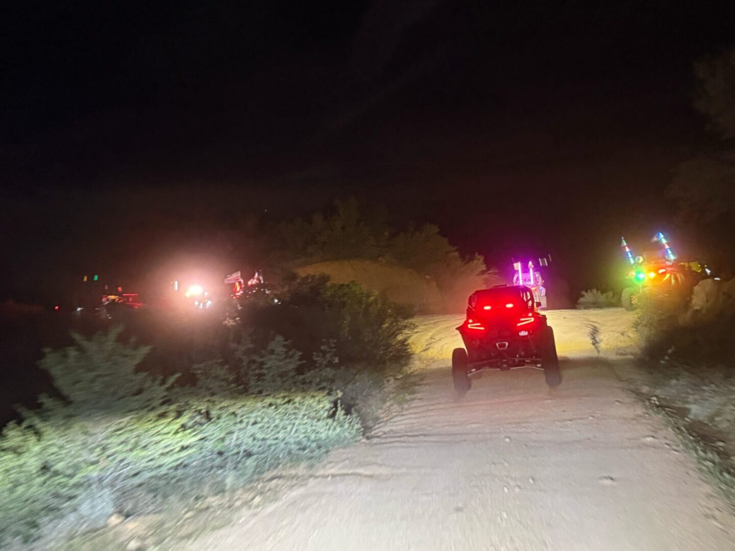 ATV driving on desert trail at night