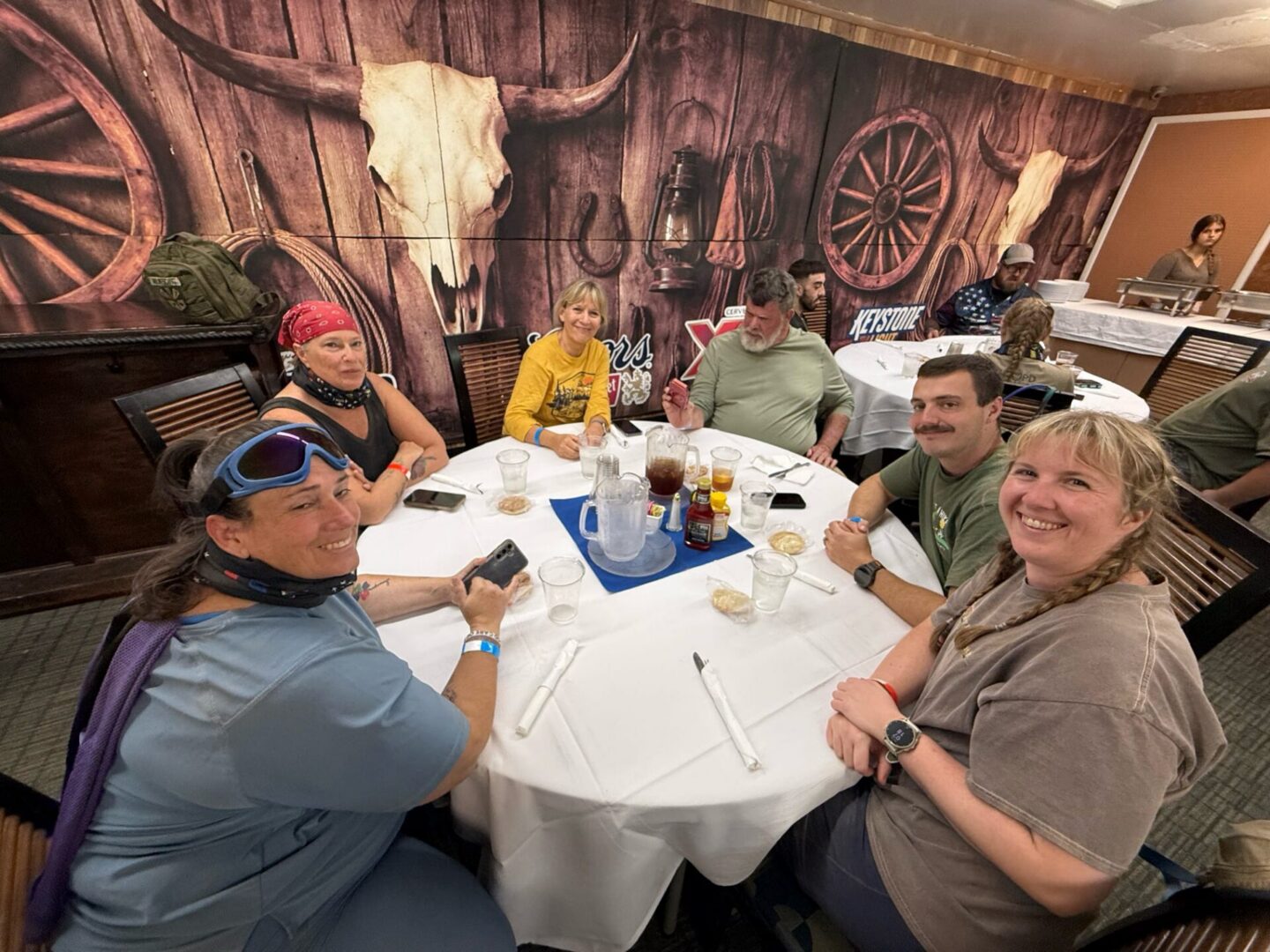 Group of people dining in western-themed restaurant