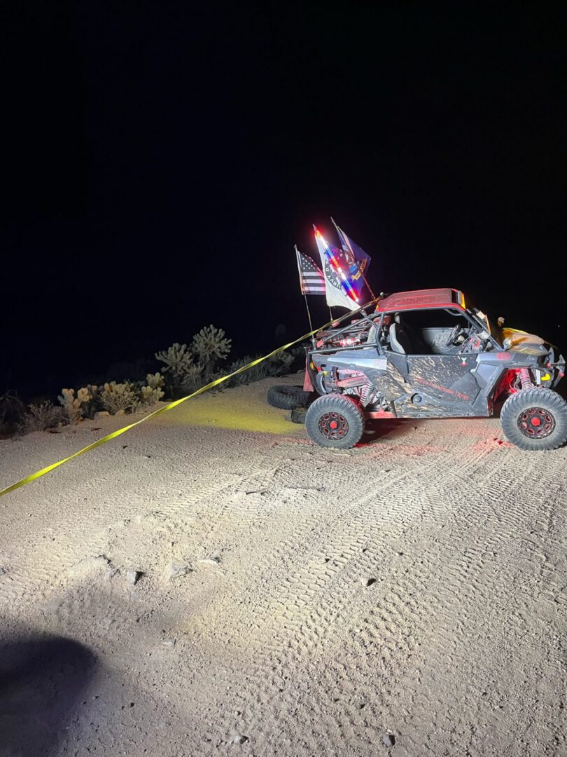 Off-road UTV with flags and caution tape