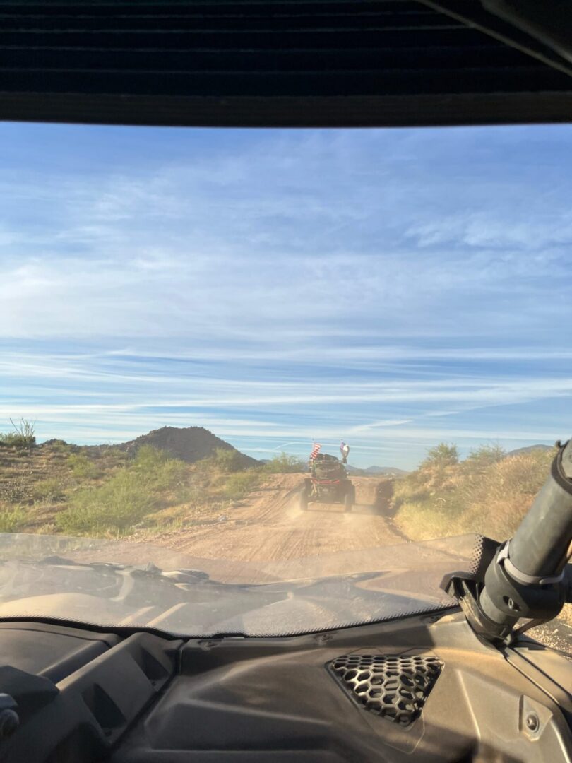 UTV trail ride on desert dirt road