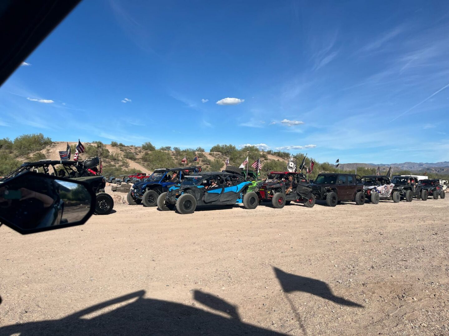 Off-road UTVs and jeeps with flags