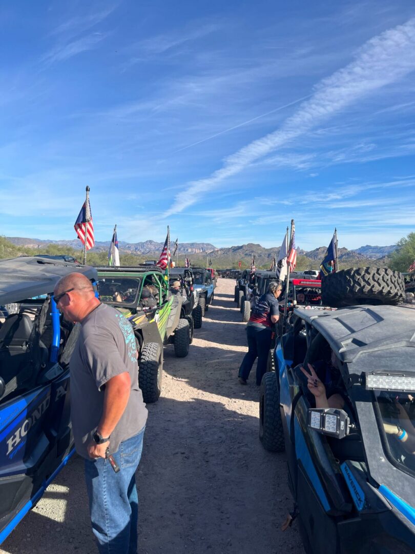 Off-road UTV convoy with American flags