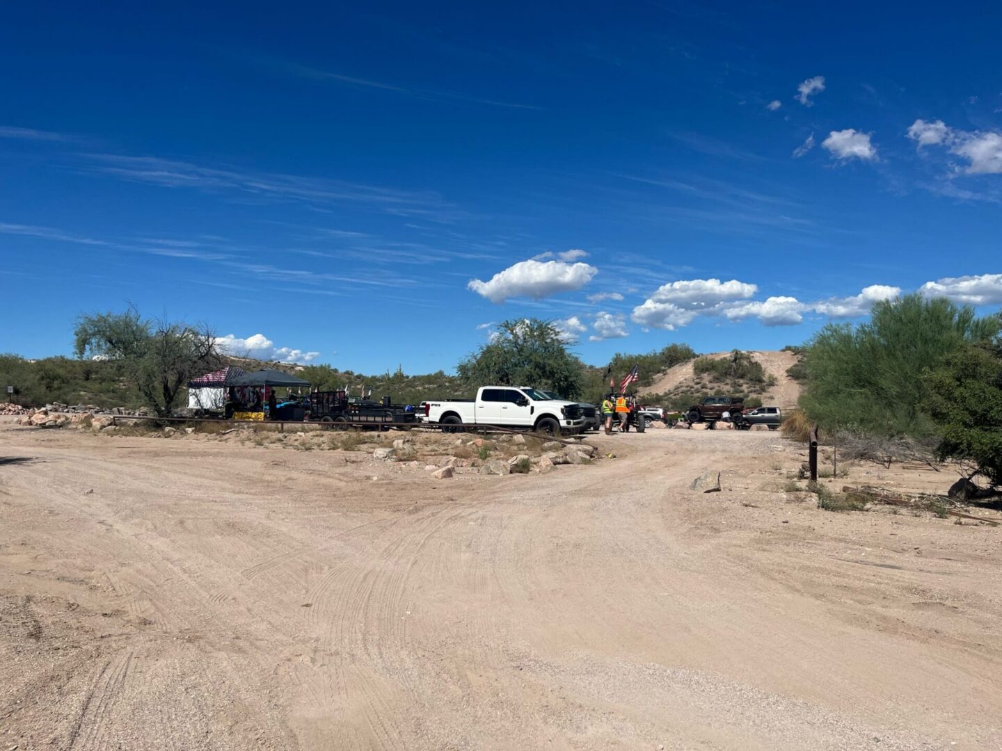 White pickup truck in desert landscape