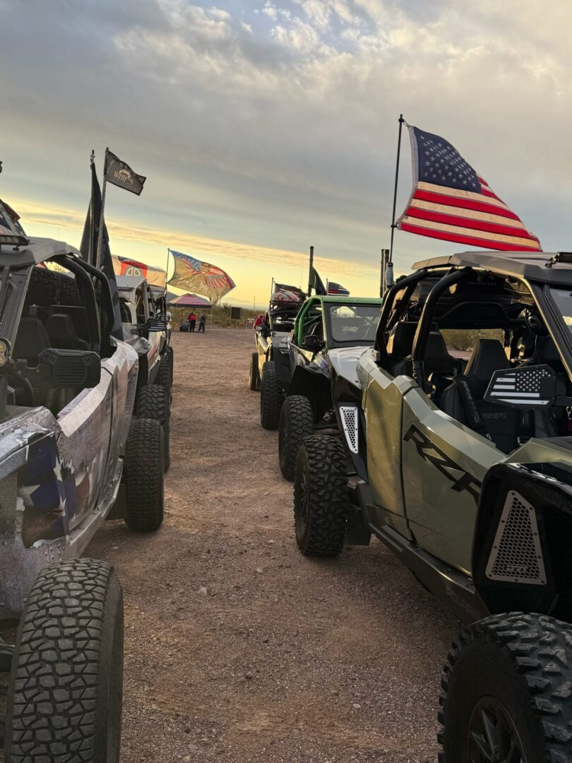 UTVs lined up with American flags